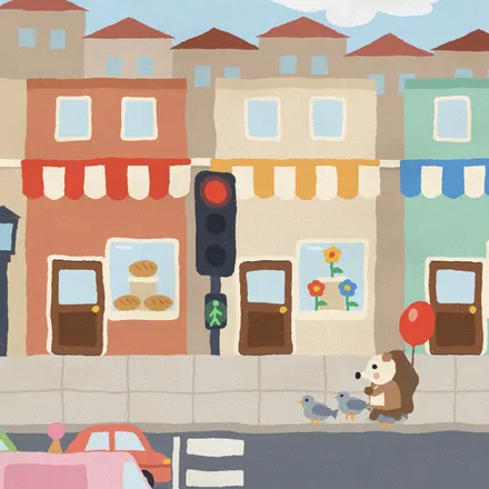 The street: shops and a traffic light